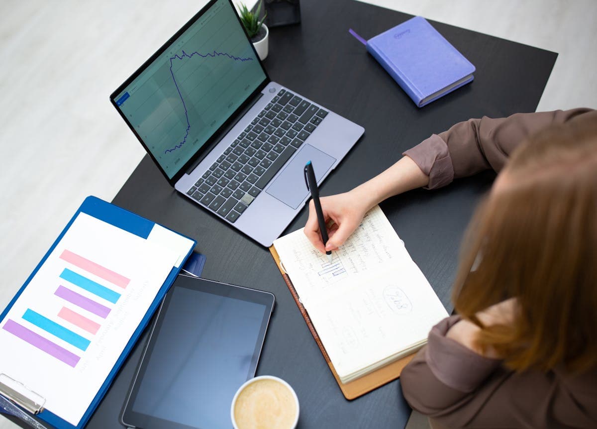Analyst planning convert pdf to excel workflow on laptop and notebook